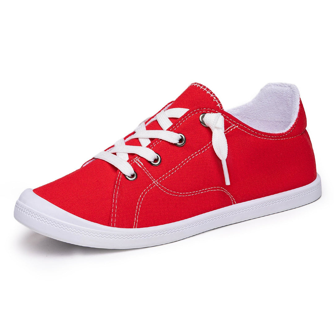 Przód damskich sneakersów low top z płócienną cholewką